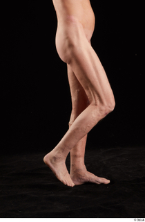 Joseph  1 calf flexing nude side view sitting 0001.jpg